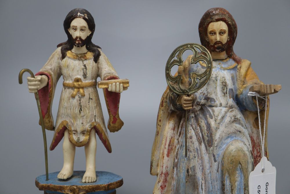 A painted carved wood religious figure of a kneeling saint and a similar painted carved wood and ivory figure, tallest 19cm